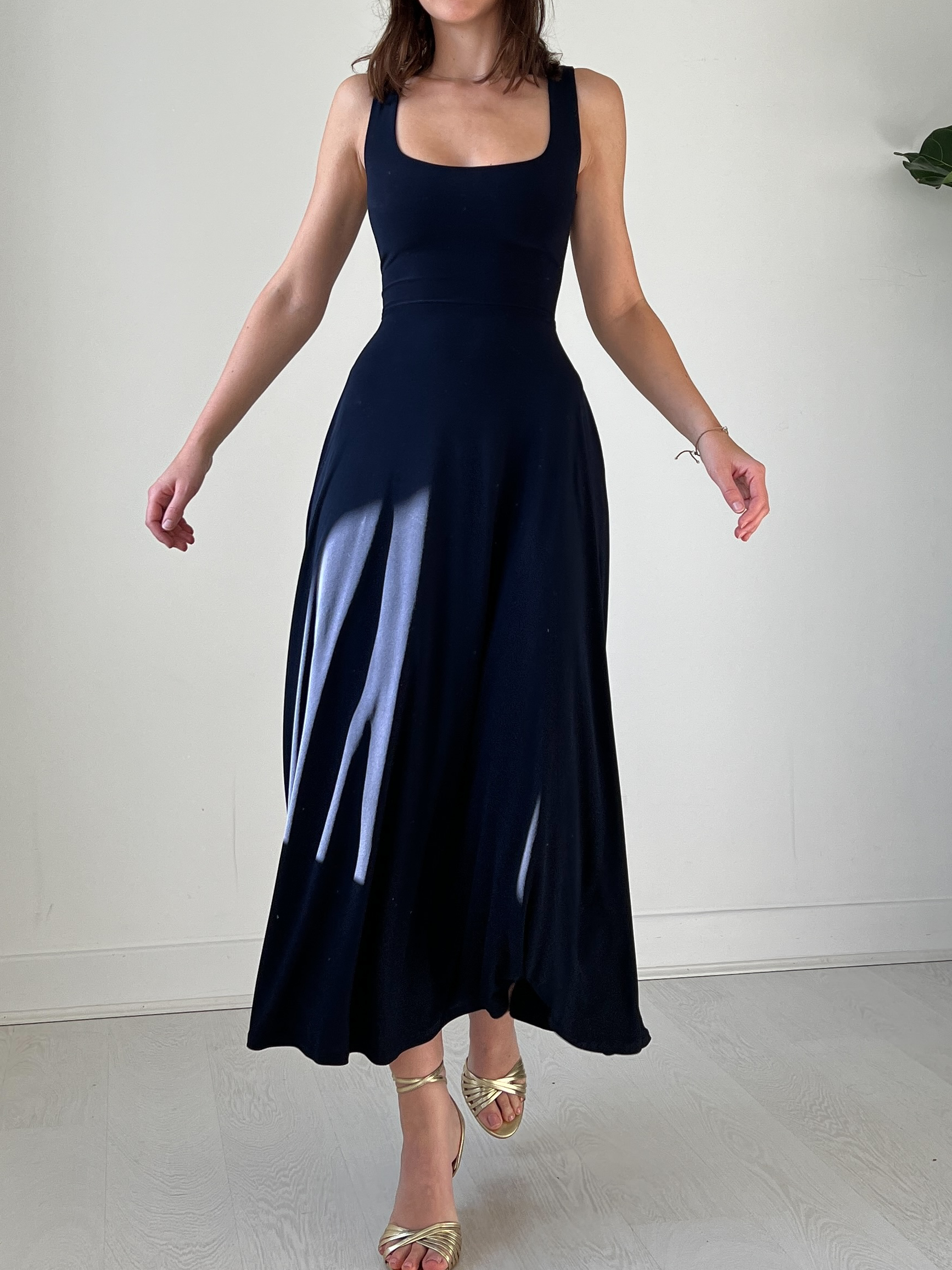 This is the 'Walter Reversible Maxi Dress' from AYM and it offers